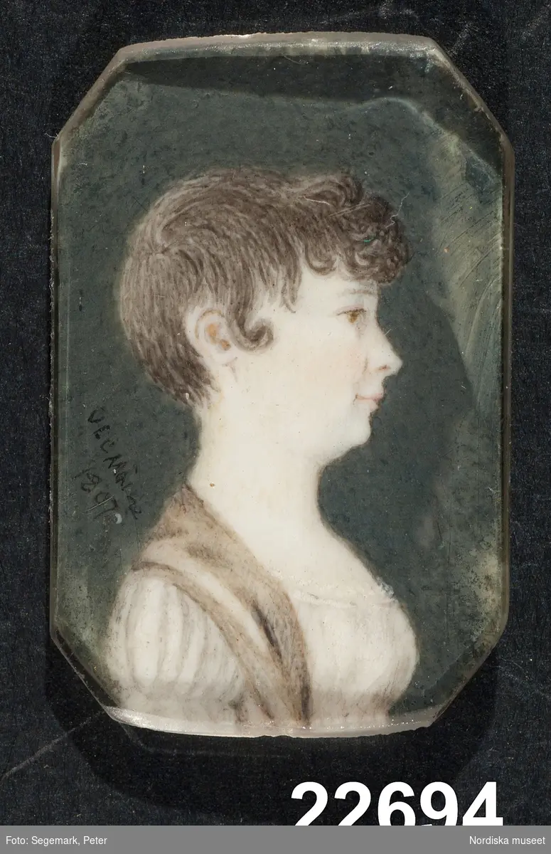 Damporträtt, bröstbild i profil.