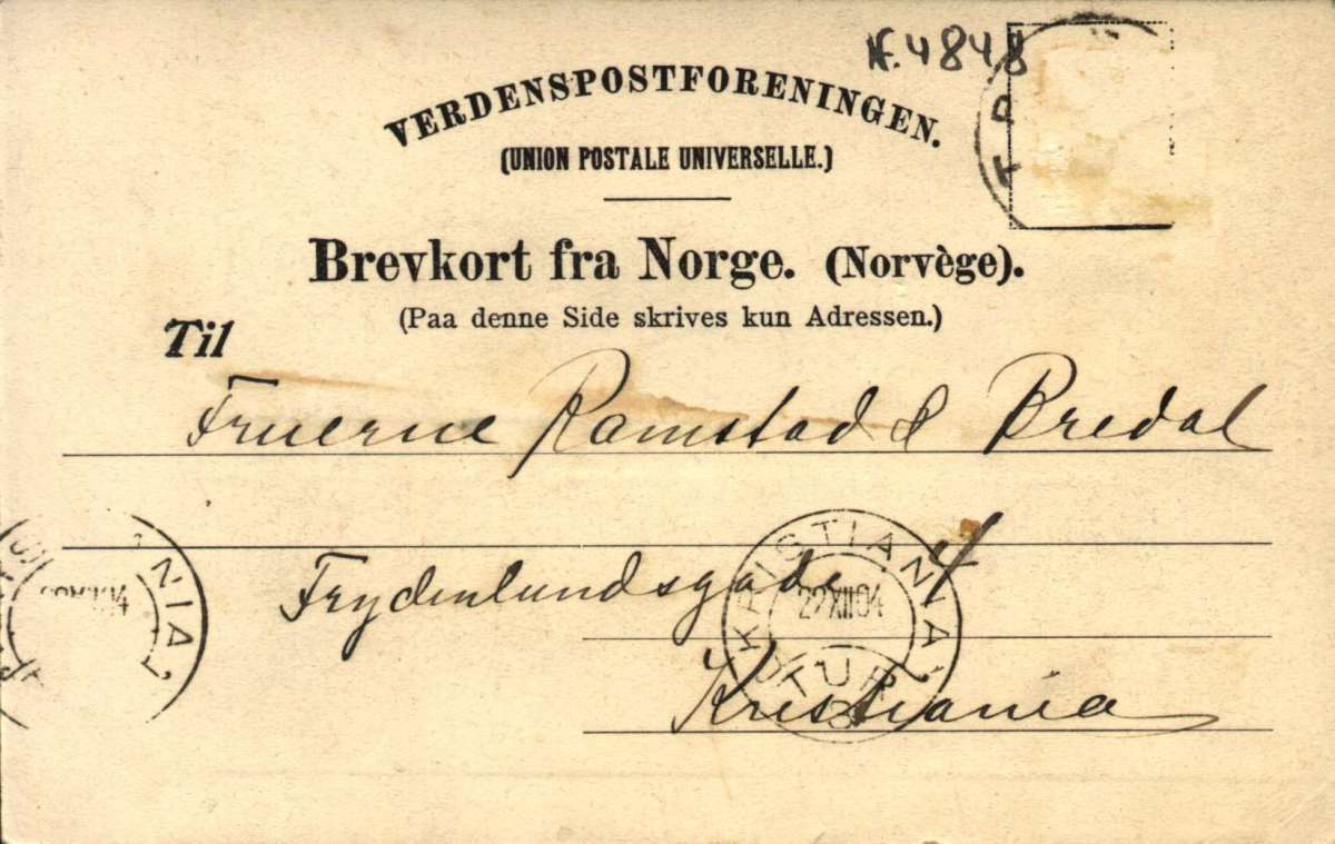 Postkort. Jule-  og nyttårshilsen. Fotografisk motiv. Motiv fra Tromsøya. Fjell og fjord. Bebyggelse. Båter. Stemplet 22.12.1904.