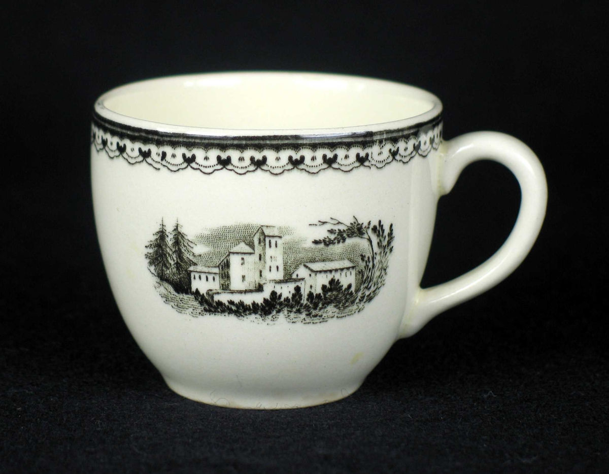 Liten kaffekopp i offwhite keramikk med sort dekor.